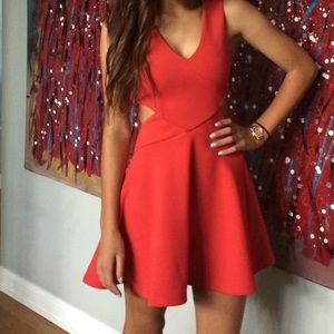 Red dress with side cut outs